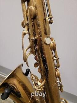 C. G. Conn 10M Tenor Saxophone #298070 with original neck holder, crocodile case