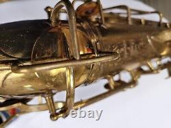 C. G. Conn 10M Tenor Saxophone #298070 with original neck holder, crocodile case