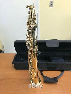 Mendini tenor saxophone with gold lacquer finish. Case and accessories